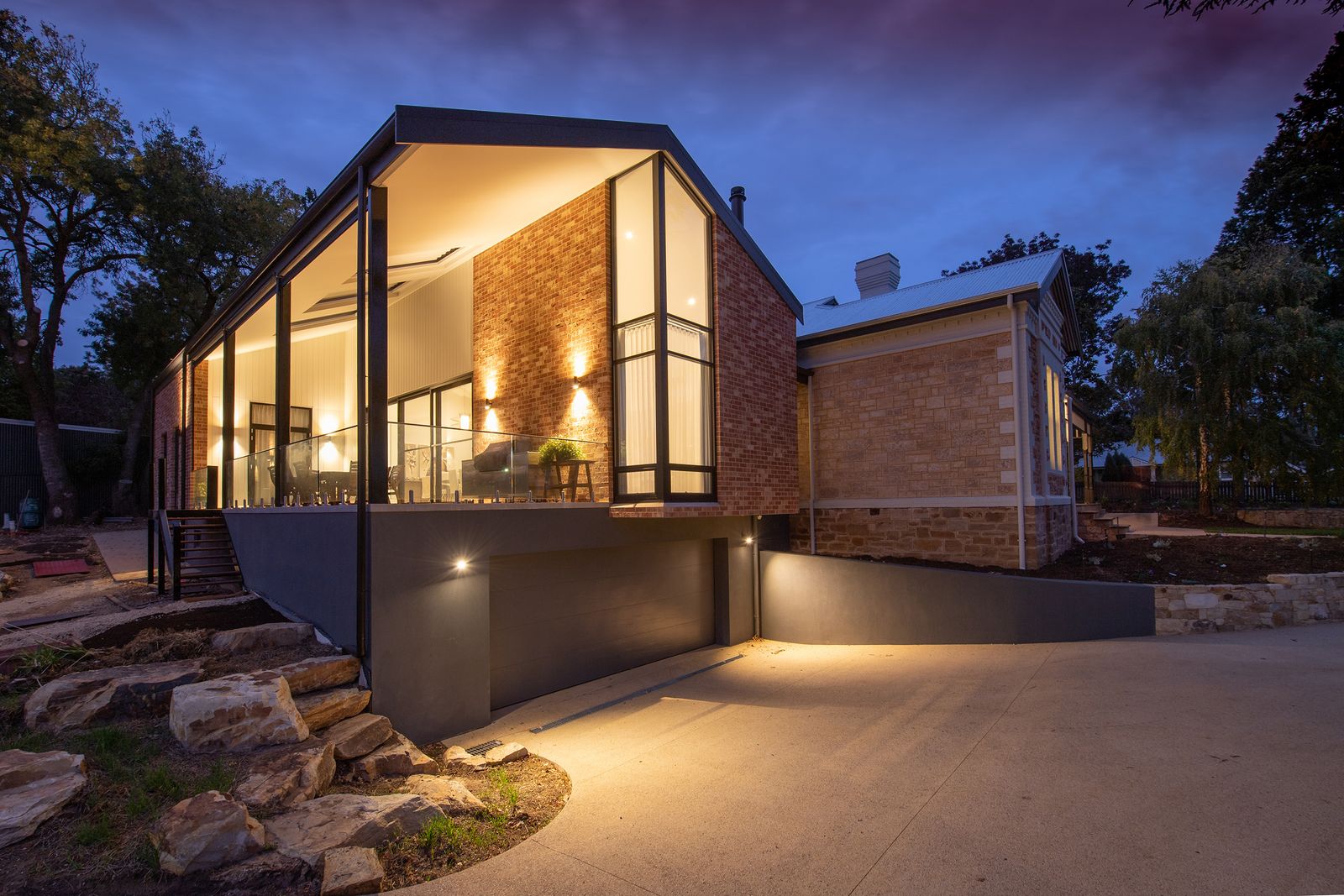 Contemporary home facade washed in warm light at dusk in Daytona Beach
